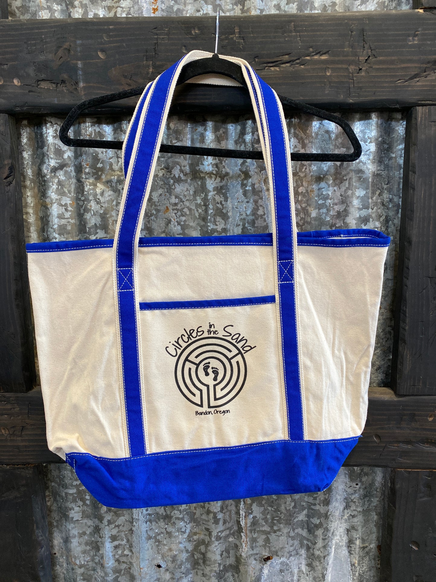 Tote bag in natural with royal blue contrast.